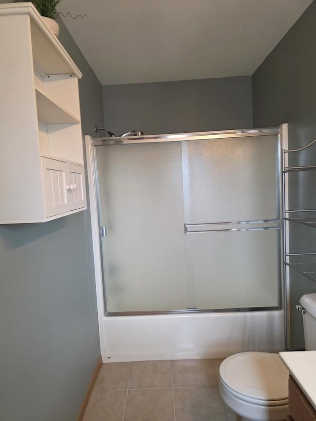 415 Andrea Ct, Harvard, IL 60033 - full bath featuring enclosed tub / shower combo, vanity, and tile patterned floors