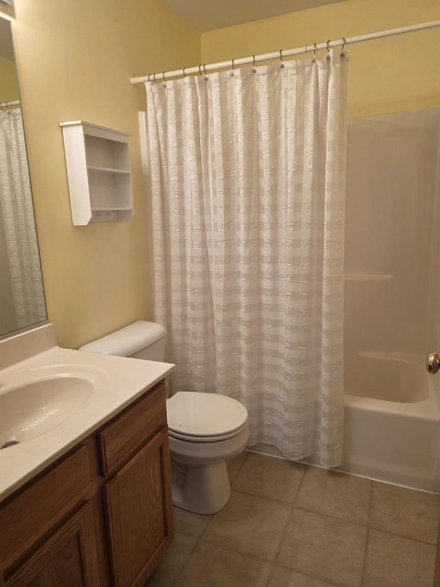 415 Andrea Ct, Harvard, IL 60033 - bathroom with vanity, tile patterned flooring, and shower / bath combo