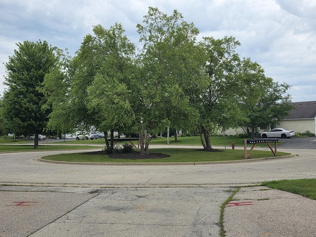 415 Andrea Ct, Harvard, IL 60033 - view of asphalt road with curbs
