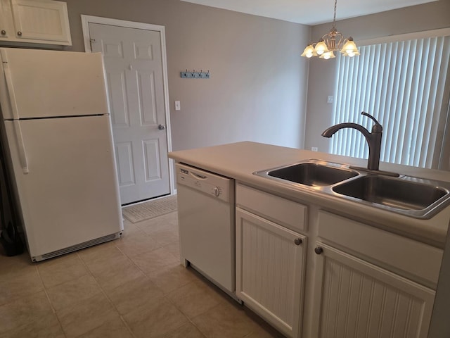 415 Andrea Ct, Harvard, IL 60033 - kitchen featuring white appliances, a chandelier, hanging light fixtures, and white cabinetry