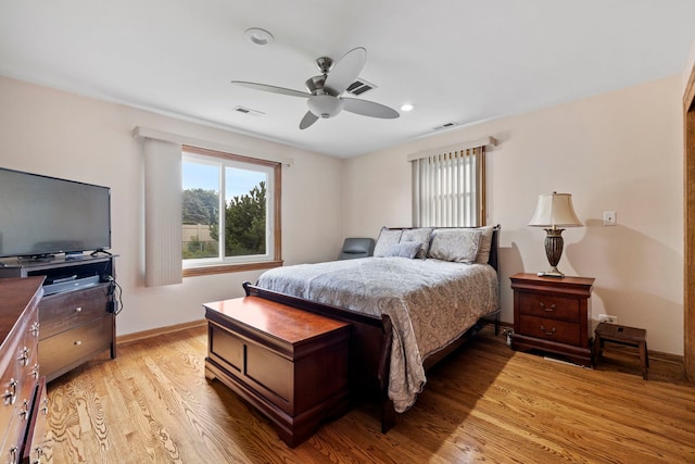 6759 W 91st St, Oak Lawn, IL 60453 - bedroom featuring light wood-style flooring, multiple windows, a ceiling fan, and recessed lighting