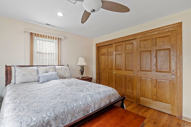 6759 W 91st St, Oak Lawn, IL 60453 - bedroom featuring a closet, wood finished floors, ceiling fan, and recessed lighting