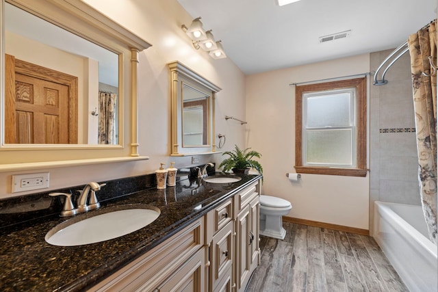 6759 W 91st St, Oak Lawn, IL 60453 - bathroom with double vanity, wood finished floors, and shower / tub combo with curtain
