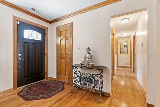 6759 W 91st St, Oak Lawn, IL 60453 - foyer with wood finished floors and crown molding