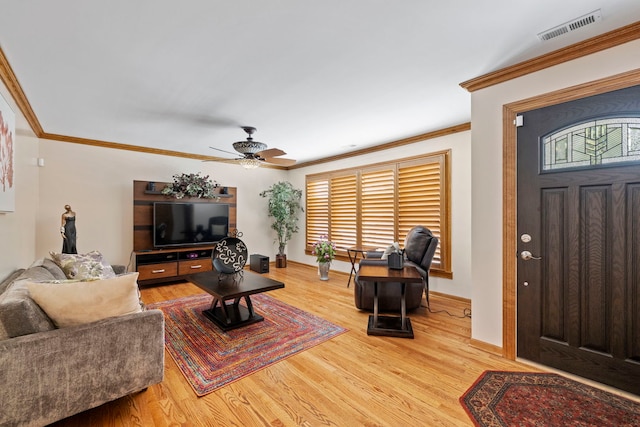 6759 W 91st St, Oak Lawn, IL 60453 - living area with crown molding, a ceiling fan, and light wood-style flooring
