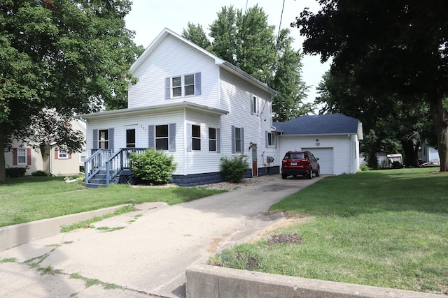 207 E N St, Walnut, IL 61376 - traditional home with a front yard and driveway