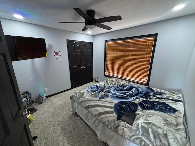 2952 Blue Oats Dr, Rockford, IL 61102 - carpeted bedroom featuring a closet, ceiling fan, and recessed lighting