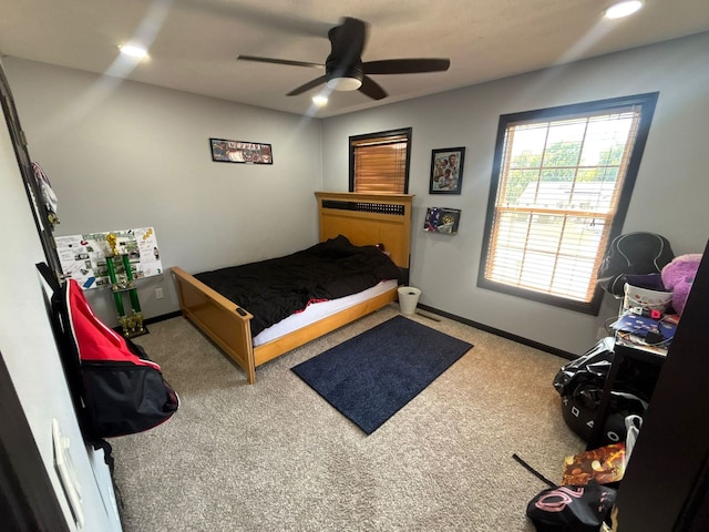 2952 Blue Oats Dr, Rockford, IL 61102 - carpeted bedroom featuring baseboards and ceiling fan