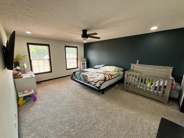 2952 Blue Oats Dr, Rockford, IL 61102 - bedroom with carpet flooring, recessed lighting, a ceiling fan, and a textured ceiling