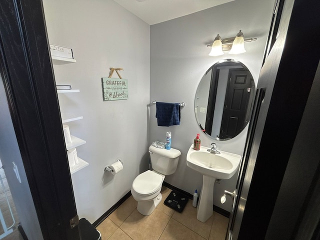 2952 Blue Oats Dr, Rockford, IL 61102 - bathroom featuring tile patterned floors and toilet