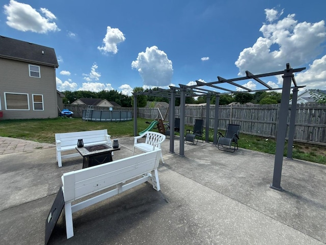 2952 Blue Oats Dr, Rockford, IL 61102 - fenced backyard featuring an outdoor fire pit, a patio, and a pergola