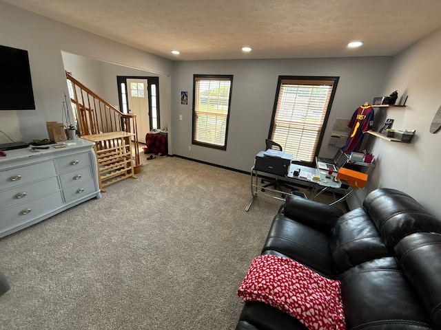 2952 Blue Oats Dr, Rockford, IL 61102 - carpeted living room featuring stairs and recessed lighting