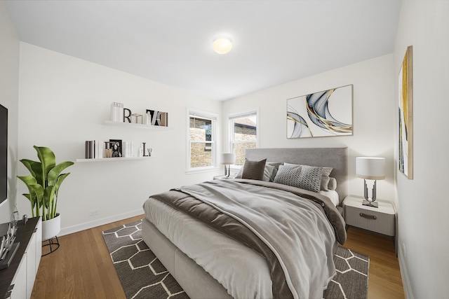 5145 Lee St, Skokie, IL 60077 - bedroom featuring wood finished floors and baseboards