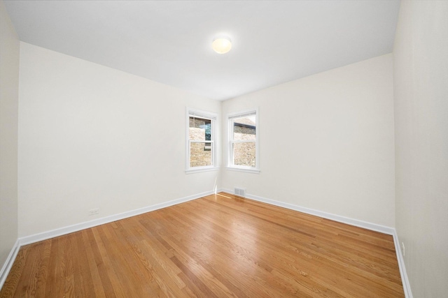 5145 Lee St, Skokie, IL 60077 - unfurnished room with light wood-style floors and baseboards