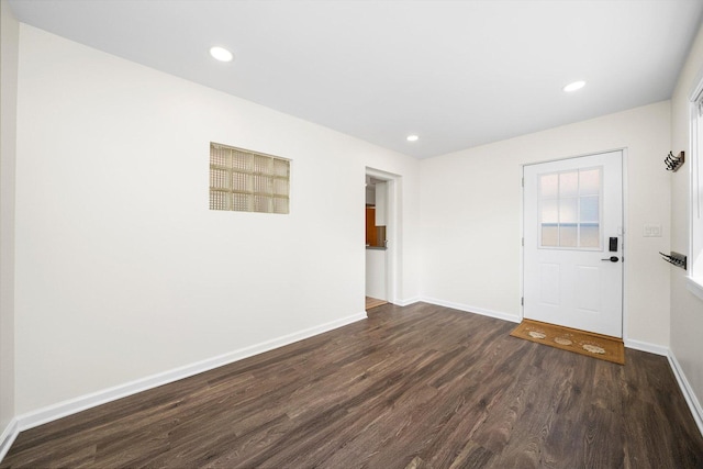 5145 Lee St, Skokie, IL 60077 - empty room with dark wood-style flooring and recessed lighting
