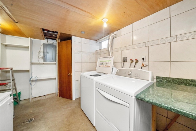 5145 Lee St, Skokie, IL 60077 - washroom featuring electric panel, separate washer and dryer, tile walls, and wooden ceiling