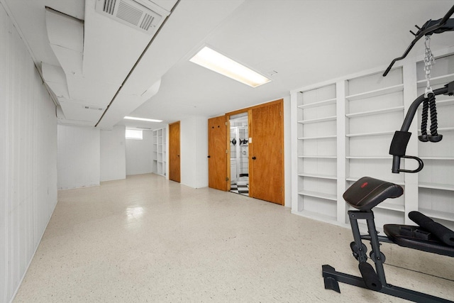 5145 Lee St, Skokie, IL 60077 - exercise area with built in shelves