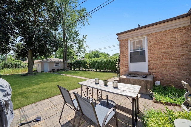 5145 Lee St, Skokie, IL 60077 - view of patio / terrace with outdoor dining space and an outbuilding