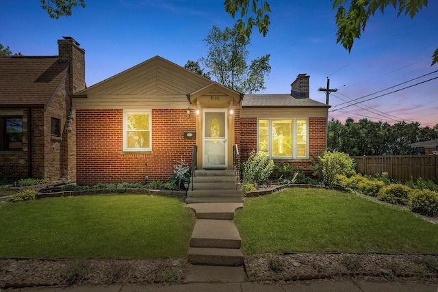 5145 Lee St, Skokie, IL 60077 - view of front of property with a chimney and brick siding