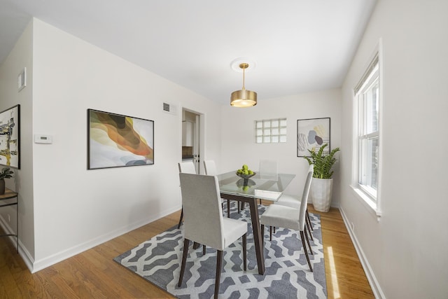 5145 Lee St, Skokie, IL 60077 - dining area with wood finished floors and baseboards