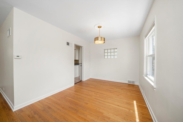 5145 Lee St, Skokie, IL 60077 - unfurnished room featuring light wood-style flooring and baseboards