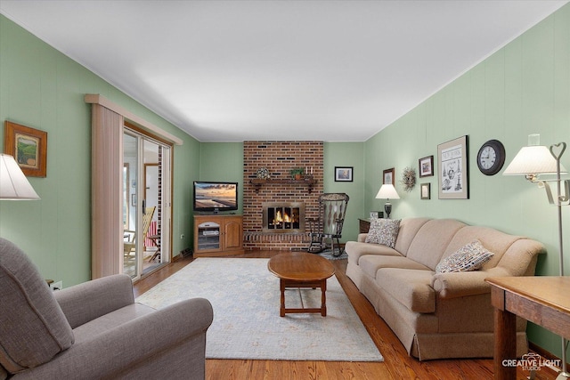 8349 Cristina Ave, Orland Park, IL 60462 - living area featuring a fireplace and wood finished floors