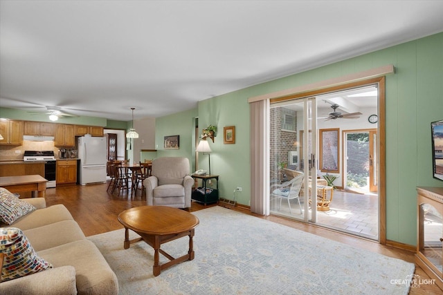 8349 Cristina Ave, Orland Park, IL 60462 - living area with ceiling fan and wood finished floors