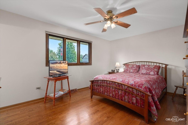 8349 Cristina Ave, Orland Park, IL 60462 - bedroom with wood finished floors and ceiling fan