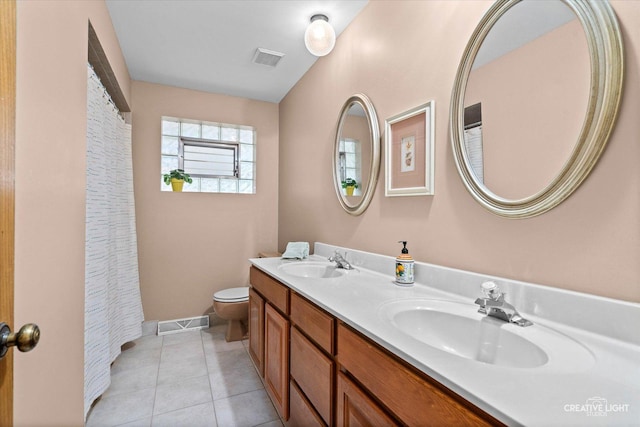 8349 Cristina Ave, Orland Park, IL 60462 - bathroom featuring double vanity and tile patterned floors