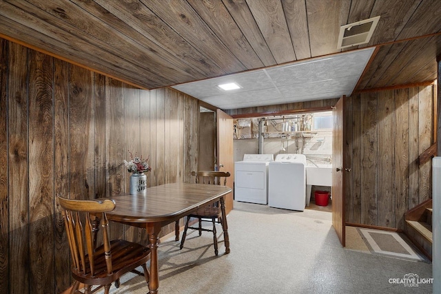 8349 Cristina Ave, Orland Park, IL 60462 - dining room with wooden ceiling, washer and dryer, wood walls, and carpet