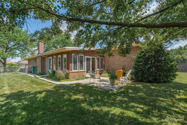 8349 Cristina Ave, Orland Park, IL 60462 - rear view of property featuring brick siding, a chimney, a patio, and a fenced backyard