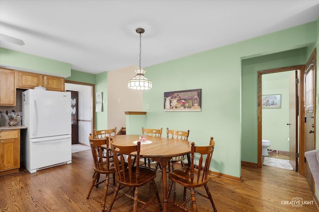 8349 Cristina Ave, Orland Park, IL 60462 - dining room with wood finished floors and baseboards