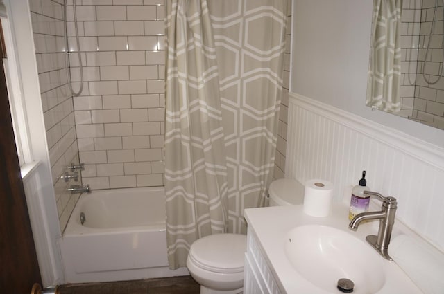 3325 Gilead Ave, Zion, IL 60099 - full bathroom featuring shower / tub combo, vanity, wainscoting, and a decorative wall