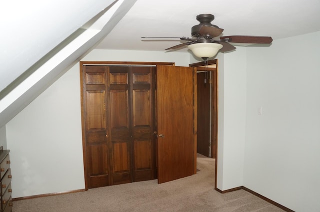 3325 Gilead Ave, Zion, IL 60099 - unfurnished bedroom with a skylight, light carpet, and a ceiling fan