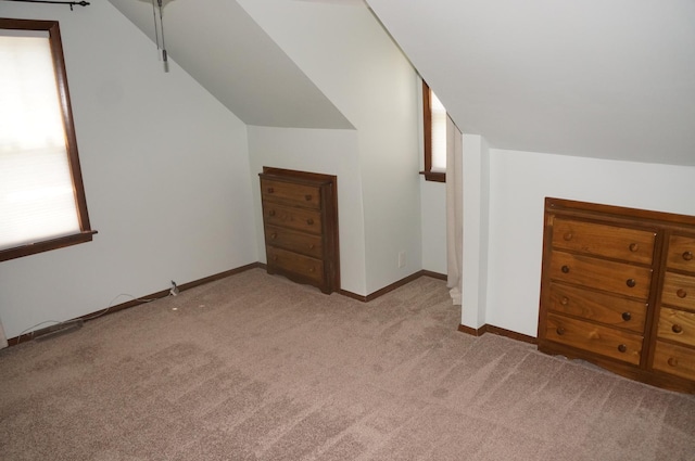 3325 Gilead Ave, Zion, IL 60099 - additional living space featuring light carpet and vaulted ceiling