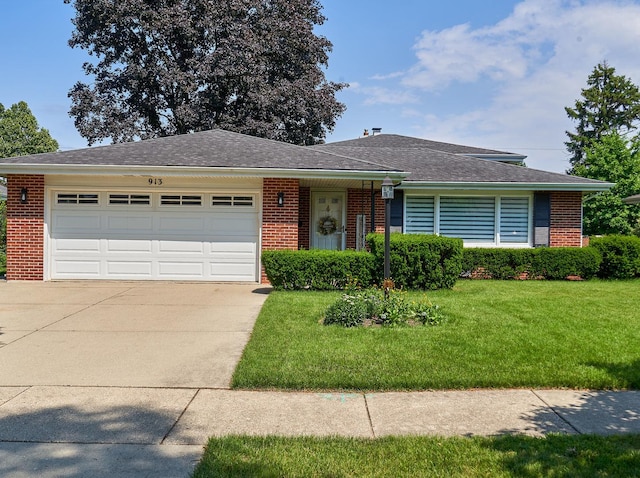 913 S See Gwun Ave, Mount Prospect, IL 60056 - single story home featuring brick siding, driveway, a front yard, and an attached garage