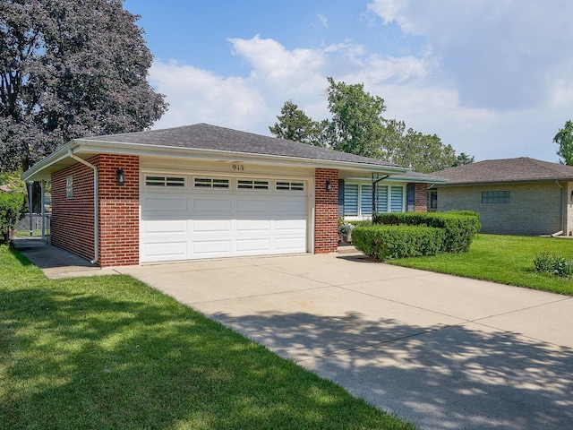 913 S See Gwun Ave, Mount Prospect, IL 60056 - ranch-style home with brick siding, an attached garage, driveway, and a front yard