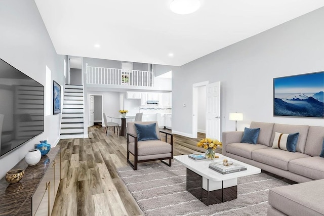 396 E Kensington Ave, Chicago, IL 60628 - living room featuring stairs and wood finished floors