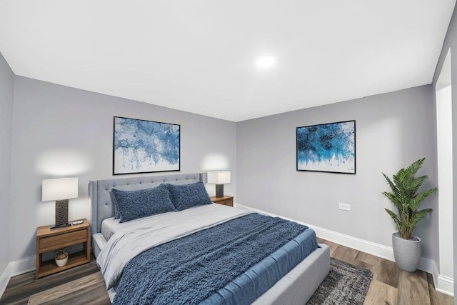 396 E Kensington Ave, Chicago, IL 60628 - bedroom featuring baseboards and wood finished floors