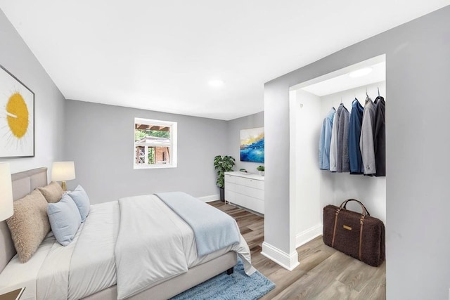 396 E Kensington Ave, Chicago, IL 60628 - bedroom with wood finished floors and baseboards
