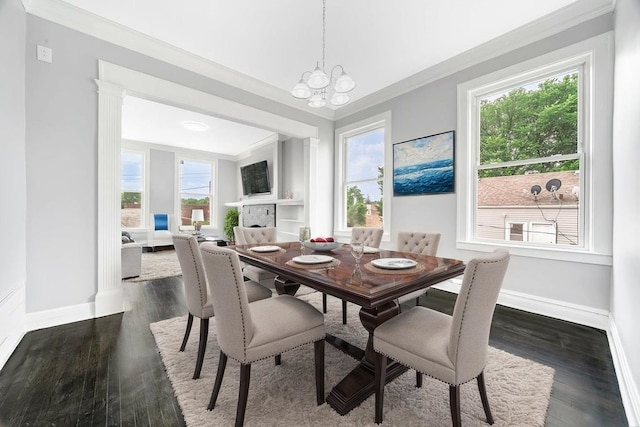 396 E Kensington Ave, Chicago, IL 60628 - dining area with crown molding, dark wood-style flooring, and a chandelier