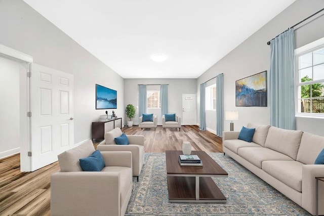 396 E Kensington Ave, Chicago, IL 60628 - living area featuring wood finished floors and healthy amount of natural light