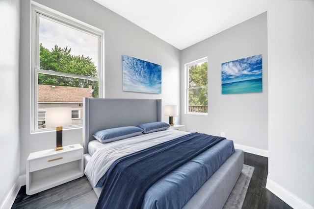 396 E Kensington Ave, Chicago, IL 60628 - bedroom with baseboards and wood finished floors
