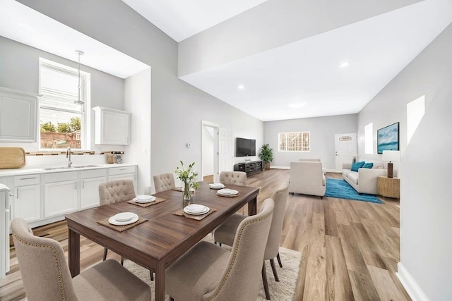 396 E Kensington Ave, Chicago, IL 60628 - dining room featuring light wood-type flooring and recessed lighting