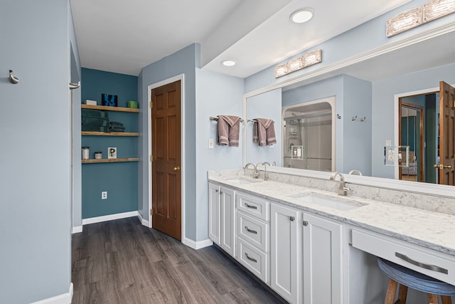 6897 Galena Rd, Bristol, IL 60512 - bathroom featuring double vanity, wood finished floors, and a shower