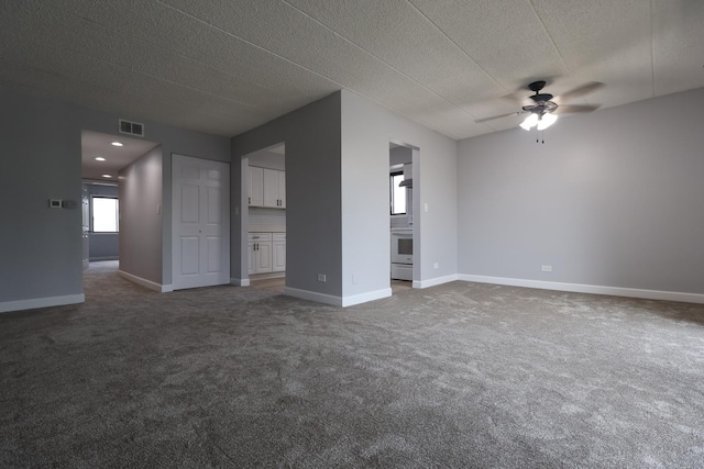 15103 Quail Hollow Dr Unit 604, Orland Park, IL 60462 - unfurnished living room with a ceiling fan, carpet flooring, and a textured ceiling