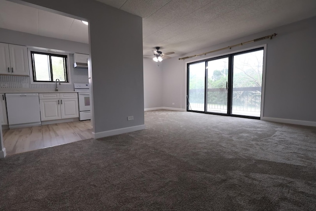 15103 Quail Hollow Dr Unit 604, Orland Park, IL 60462 - unfurnished living room with light colored carpet and a ceiling fan