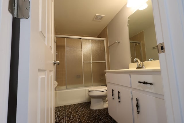15103 Quail Hollow Dr Unit 604, Orland Park, IL 60462 - bathroom featuring vanity, bath / shower combo with glass door, and tile patterned floors
