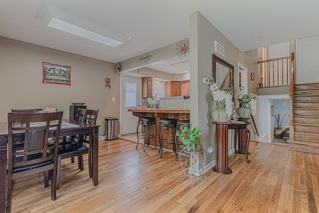 374 Heine Ave, Elgin, IL 60123 - dining room with light wood-type flooring and stairway