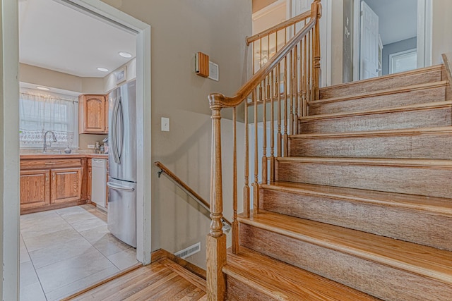 374 Heine Ave, Elgin, IL 60123 - stairway featuring baseboards